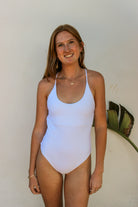 One piece with a scooped neck and racerback in White
