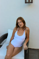 One piece with a scooped neck and racerback in White