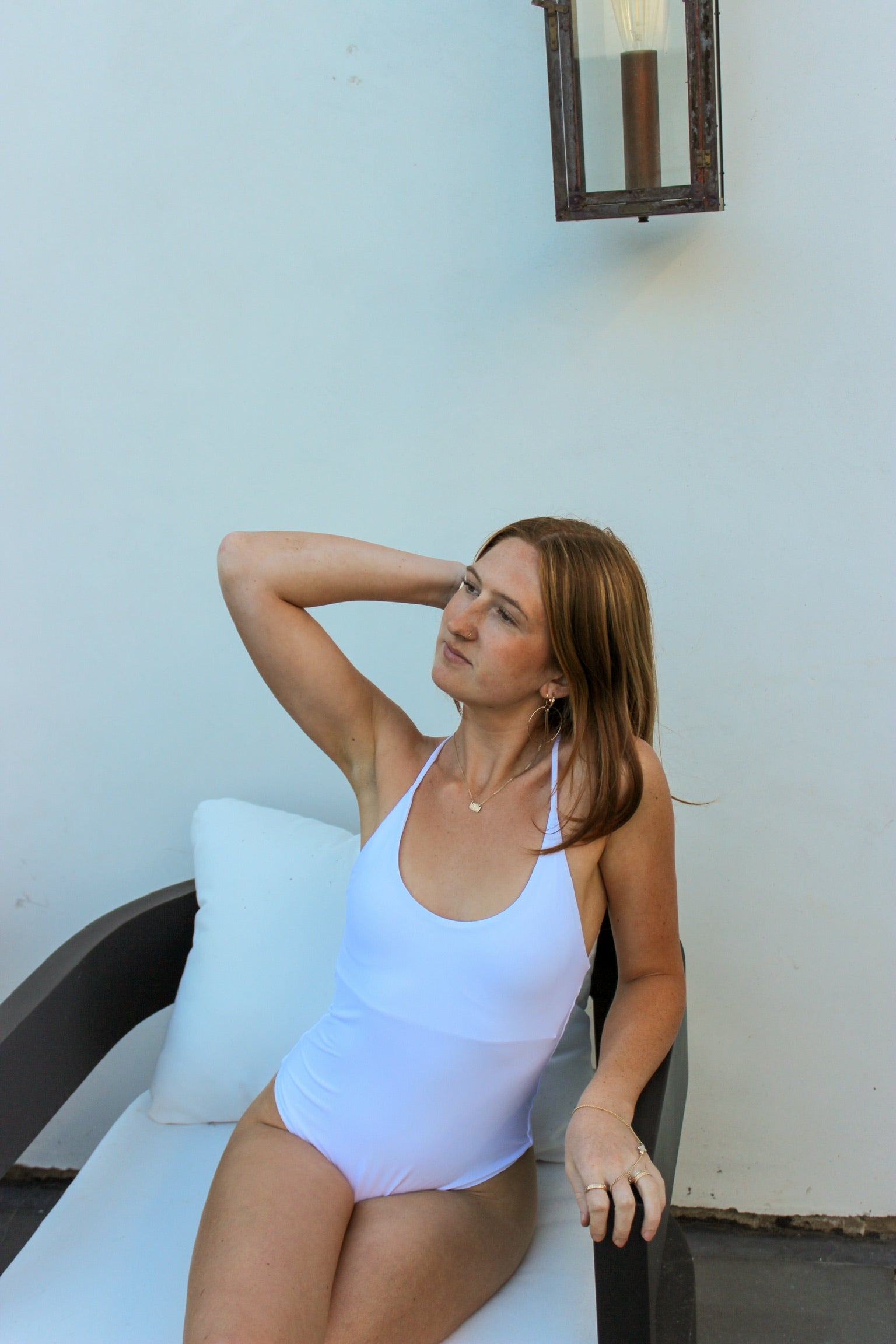 One piece with a scooped neck and racerback in White