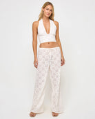 Cropped halter top with a deep plunging neckline in Cream