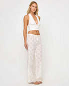 Cropped halter top with a deep plunging neckline in Cream