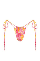 Skimpy bikini bottom with a single tie side in colorful print