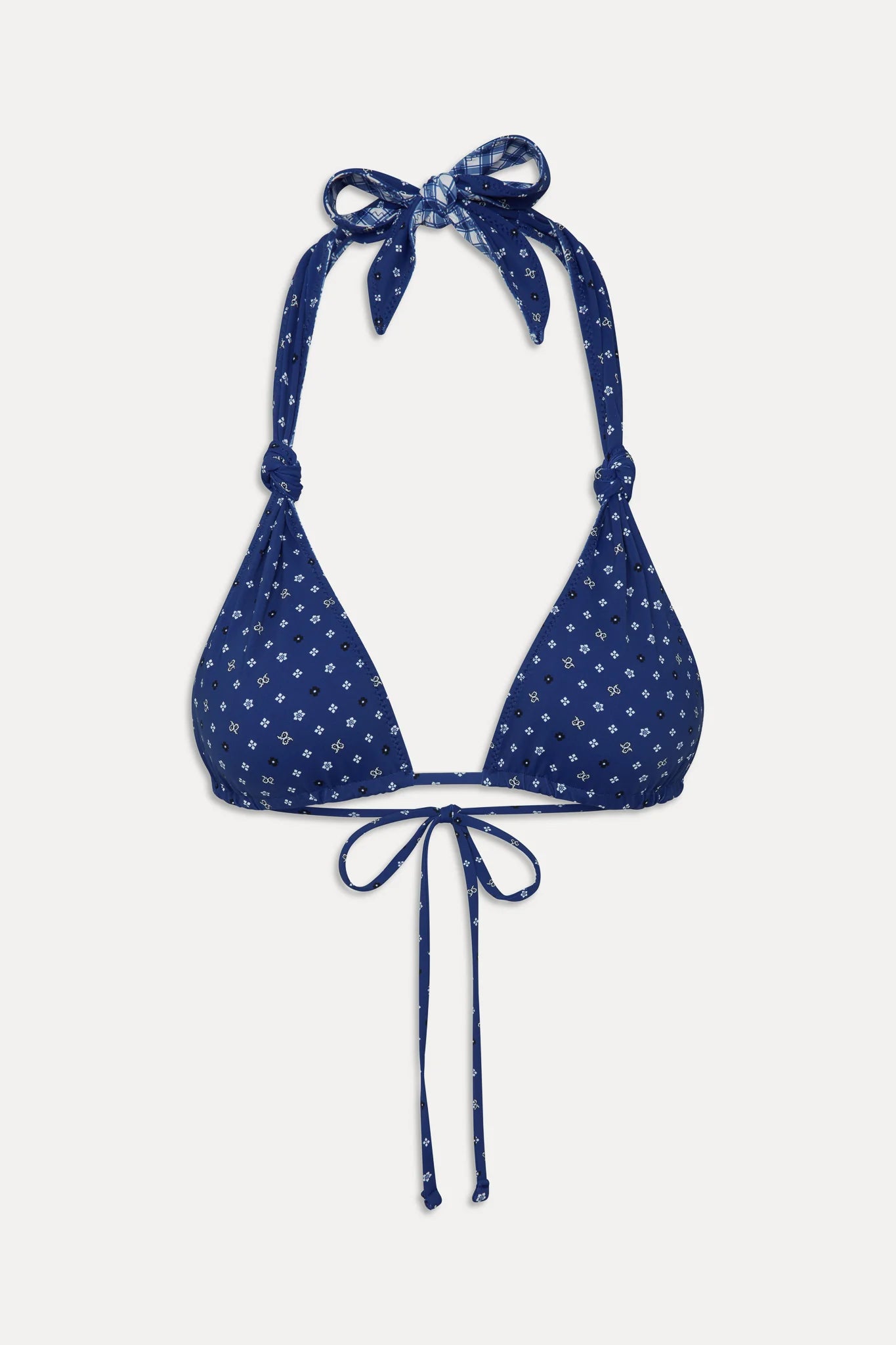 Adjustable triangle top with knotted halter ties  that reverses from gingham to star print