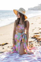 One size wrap skirt with a bright multicolor floral print