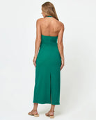 Green body hugging midi dress with a halter neckline and u bar front