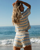 Cropped crochet cotton top with scalloped  hem in multicolor striped print