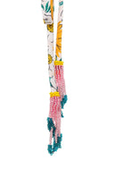 Skimpy tie side bottom that cinches in the back with hand beading in multicolor print