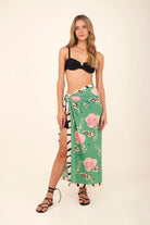Long green sarong with pink floral print and zebra stripes with tassels