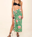 Long green sarong with pink floral print and zebra stripes with tassels