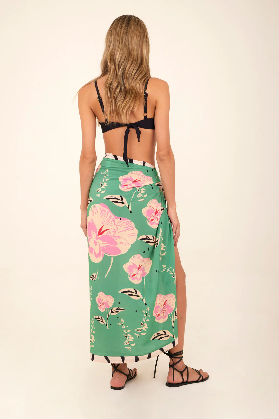 Long green sarong with pink floral print and zebra stripes with tassels