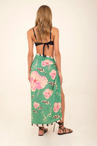 Long green sarong with pink floral print and zebra stripes with tassels