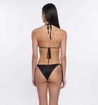 Shimmery black triangle top with gold hardware on the straps