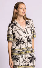 Collared button down shirt in palm tree print 