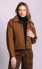 Brown winter coat with buttons and front pockets