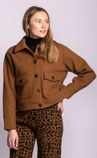 Brown winter coat with buttons and front pockets