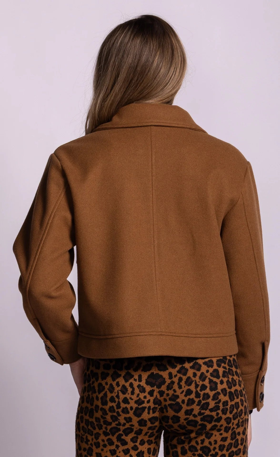 Brown winter coat with buttons and front pockets