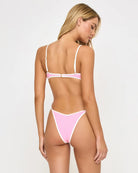 Ribbed pink bandeau top with cream color blocking and removable straps