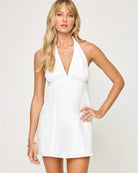 V-neck sleeveless mini dress with halter tie behind the neck in Cream