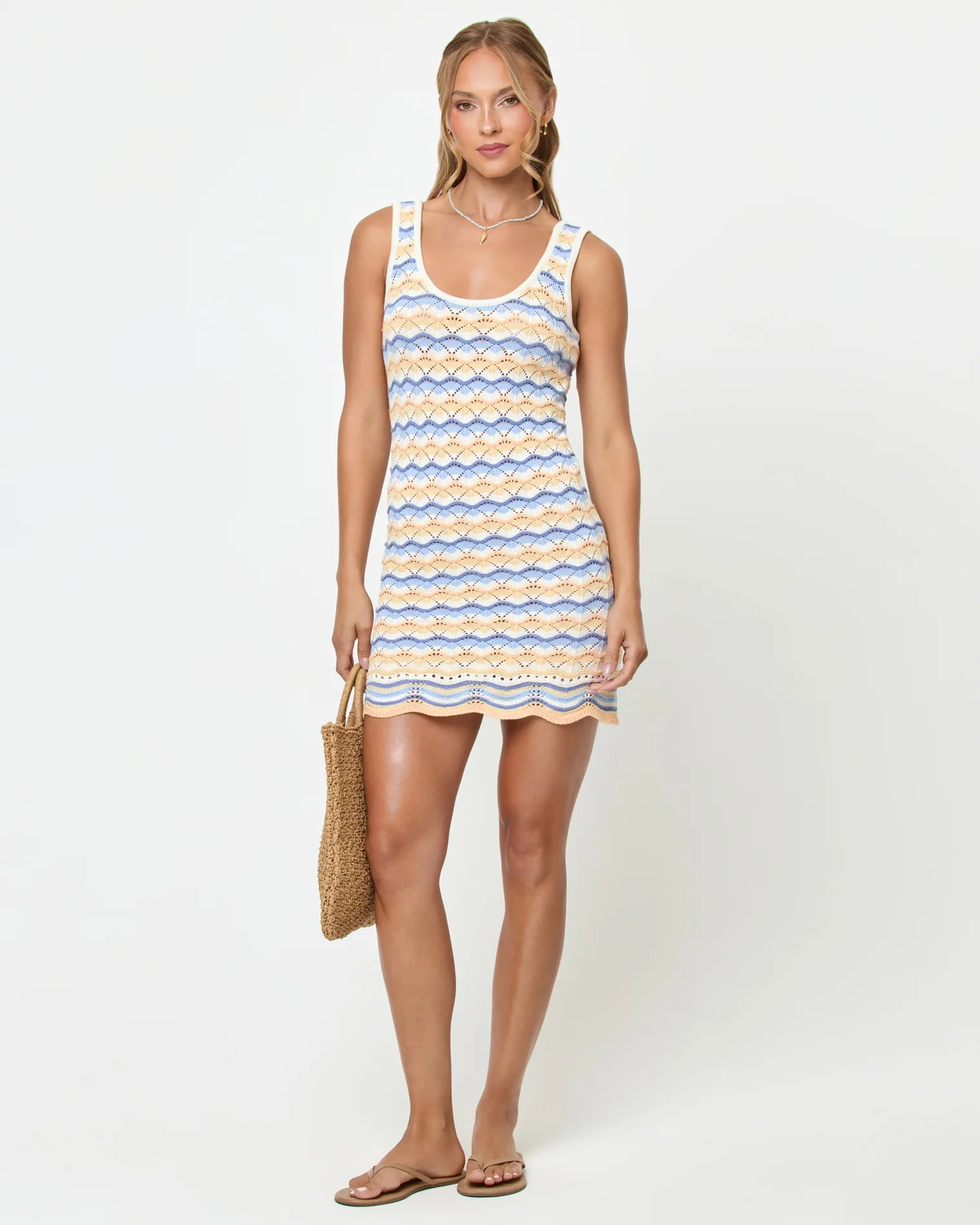 Crochet cotton mini dress with a scalloped hem