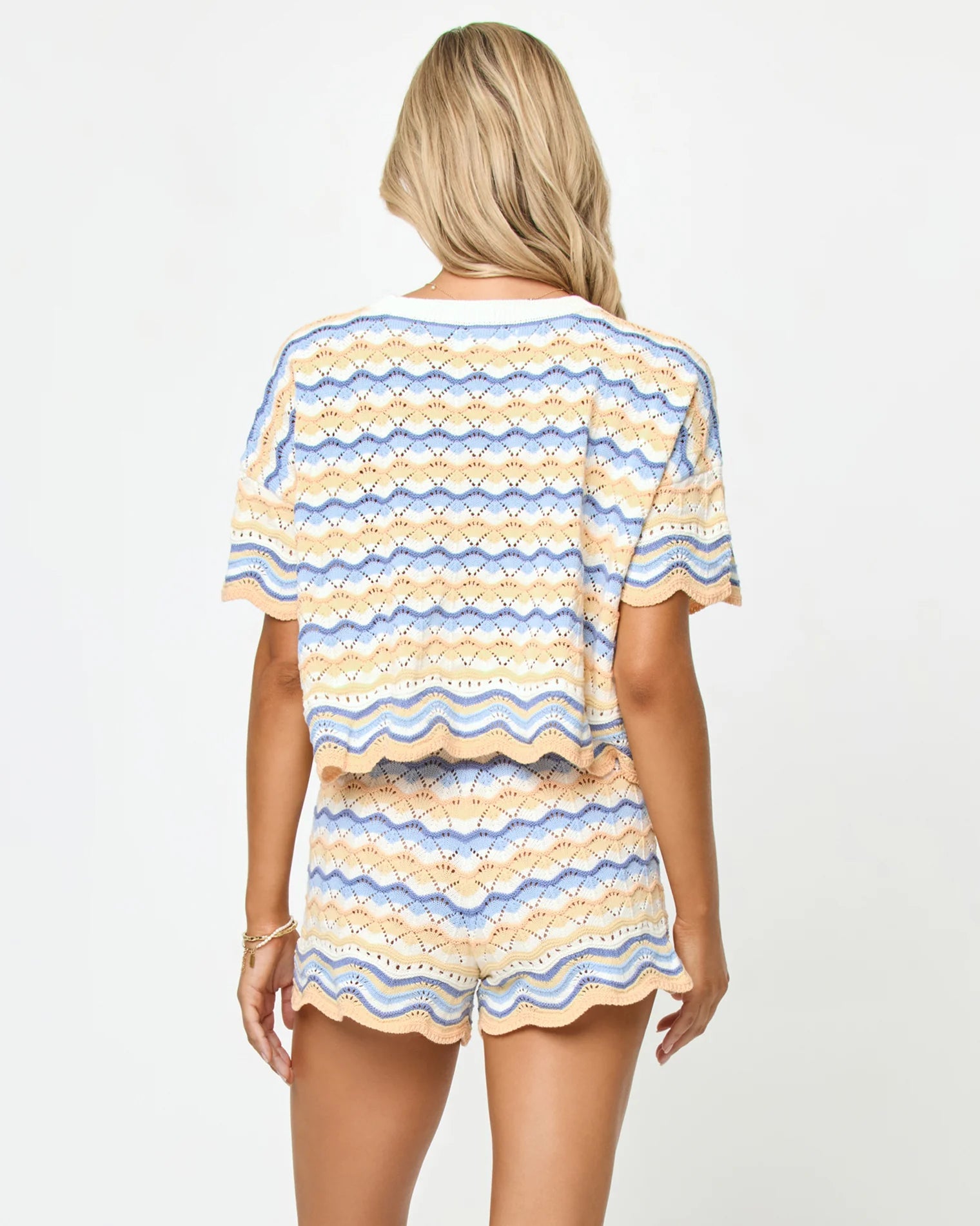 Cropped crochet cotton top with scalloped  hem in multicolor striped print