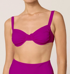 Purple top with thick shoulder straps and underwire support