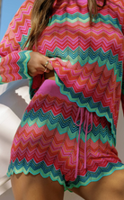 Multicolor sweater with scalloped hem