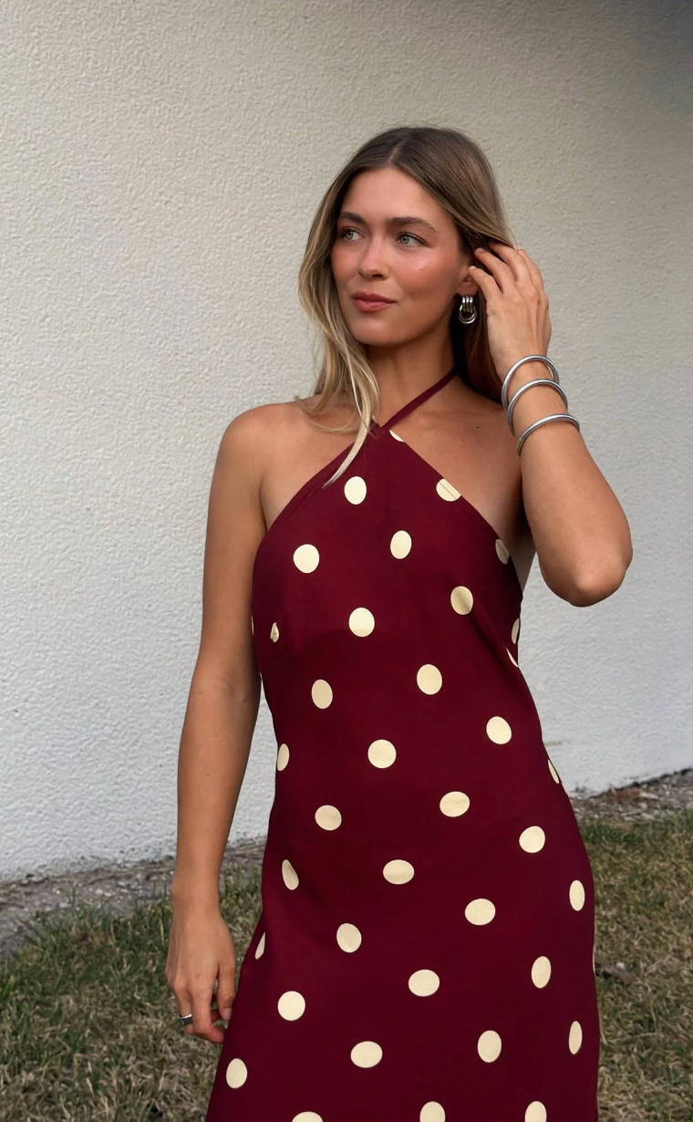 Maxi dress with halter neckline and open back in polka dot print