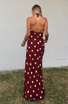Maxi dress with halter neckline and open back in polka dot print