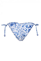 Ruched back bottom with ruffled edges and beaded tie sides in blue floral print