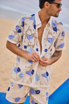 Collared button down shirt with crochet details and blue print