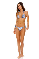 Adjustable triangle top with ruffled edges and embroidered floral print in blue and white