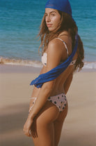 Tie side bikini bottom with a Latin cut in polka dot print