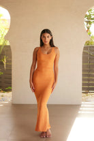 light orange fitted tank style maxi dress 