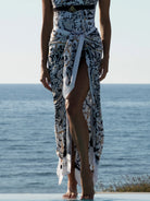 Long white sarong with black and gold print