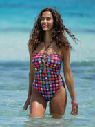 Plunging one piece with ring detail and a low back in colorful print