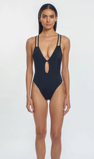 Plunging black one piece with front cutout, double shoulder straps and a racerback design