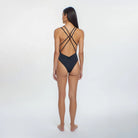 Plunging black one piece with front cutout, double shoulder straps and a racerback design