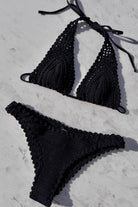 Hand crocheted plunging halter bikini top in black