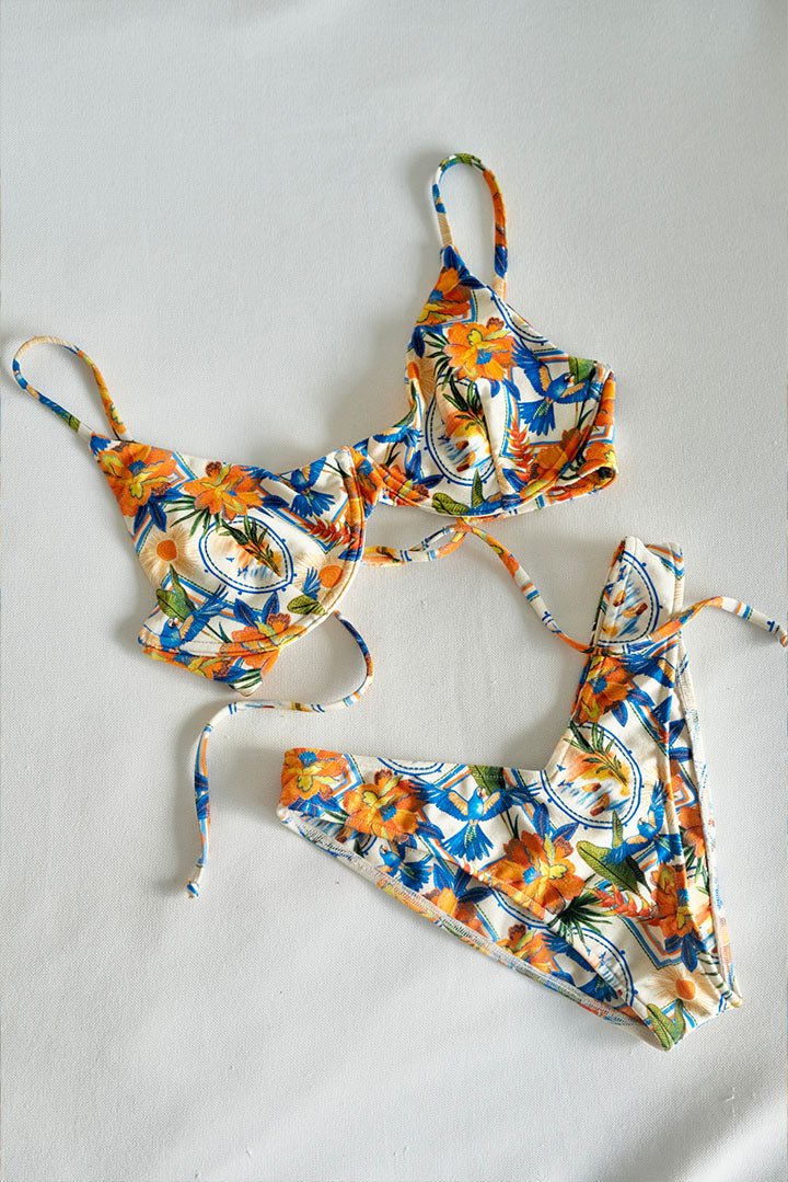 High leg v-shape bottom with minimal coverage in bright tropical print