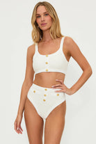 Textured ivory scoop neck top with decorative gold buttons down the front