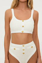 Textured ivory scoop neck top with decorative gold buttons down the front