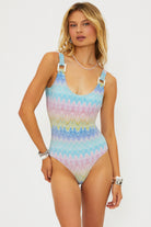 Shimmery scoop neck one piece with square shaped ivory hardware in multicolor pastel print