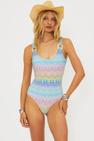 Shimmery scoop neck one piece with square shaped ivory hardware in multicolor pastel print