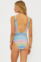 Shimmery scoop neck one piece with square shaped ivory hardware in multicolor pastel print