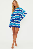 Open knit shorts with drawstring and elastic waistband in blue and turquoise wavy stripes