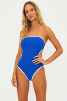 One piece with removable straps and side cutouts in blue with white blocking