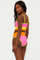 Pink, orange, and yellow ribbed bottom with a high waisted fit