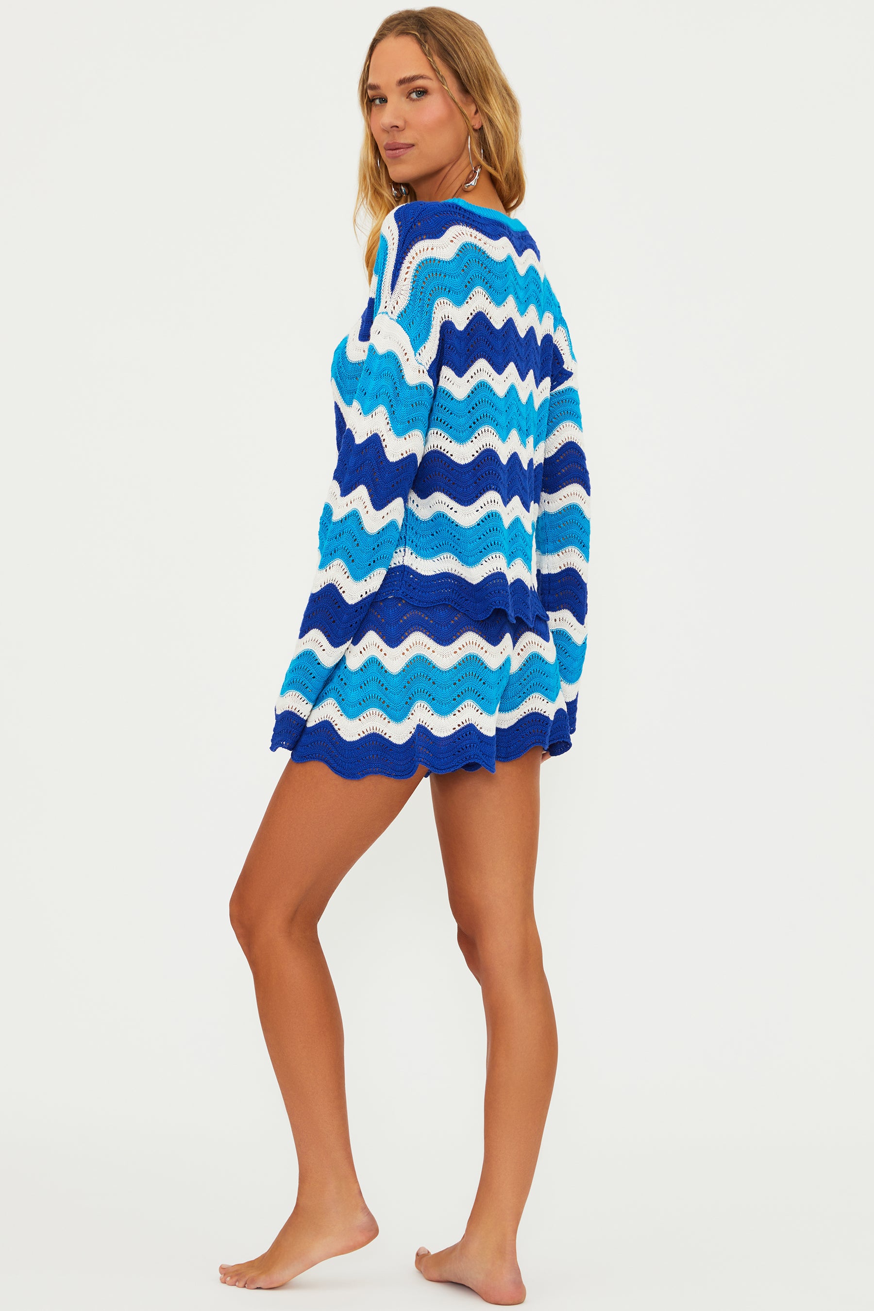 Open knit shorts with drawstring and elastic waistband in blue and turquoise wavy stripes