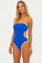 One piece with removable straps and side cutouts in blue with white blocking