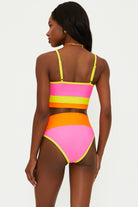 Pink, orange, and yellow ribbed bottom with a high waisted fit